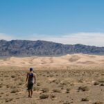 walking in the gobi desert of mongolia