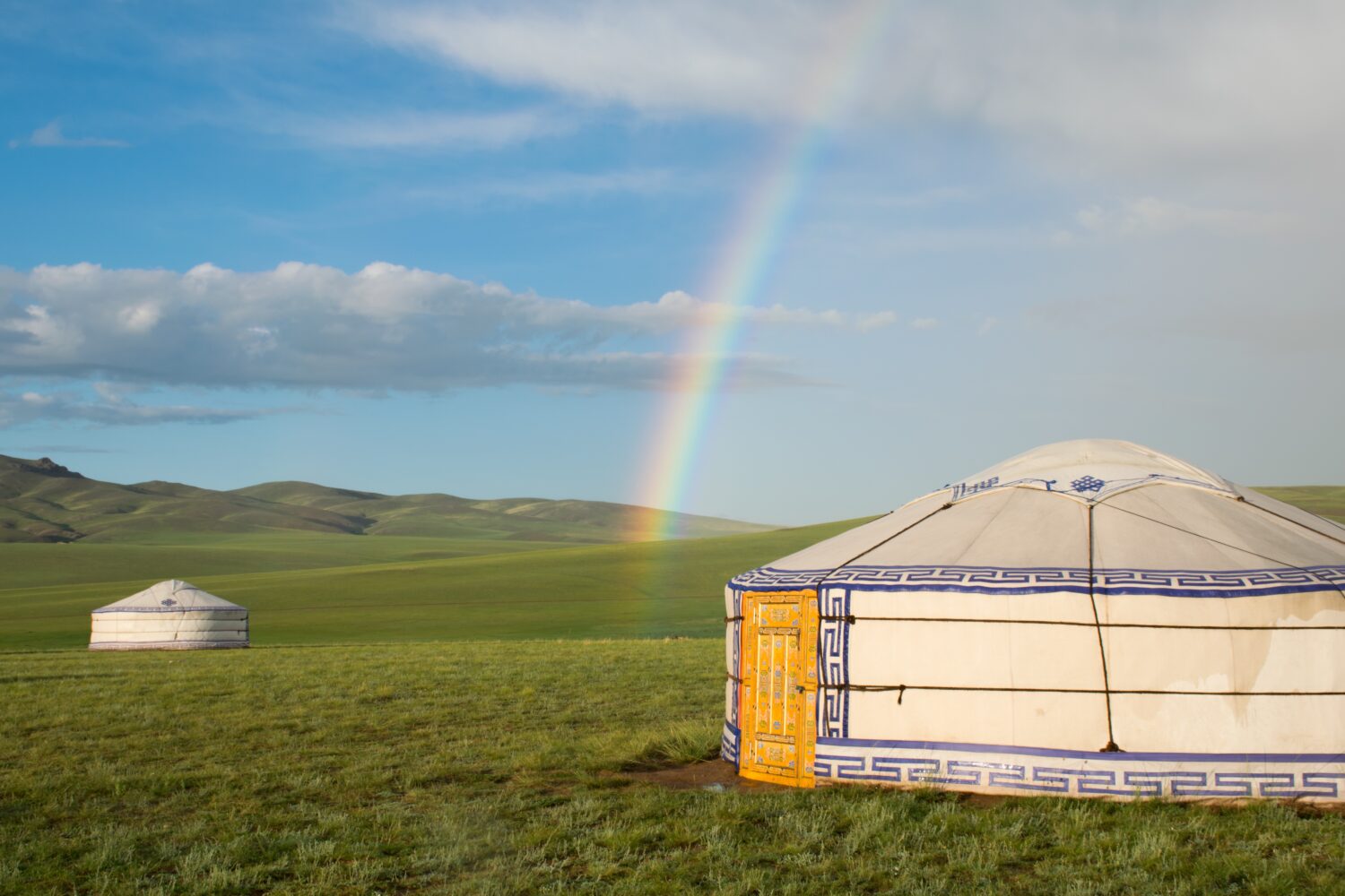 mongolian ger and a rainbow in the steppe