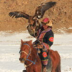 Mongolian eagle hunter in Western Mongolia Altai mountains