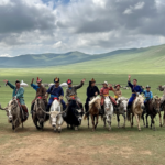 This photograph is not just a visual treat but a window into the enduring spirit and rich heritage of Mongolian nomads. It beautifully illustrates the symbiotic relationship between the nomads and their environment, showcasing a way of life that has remained largely unchanged for generations.